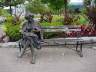 Statue Of Lady Hunting For Glasses At Entrance Stanley Park, Canada Stock Photographs
